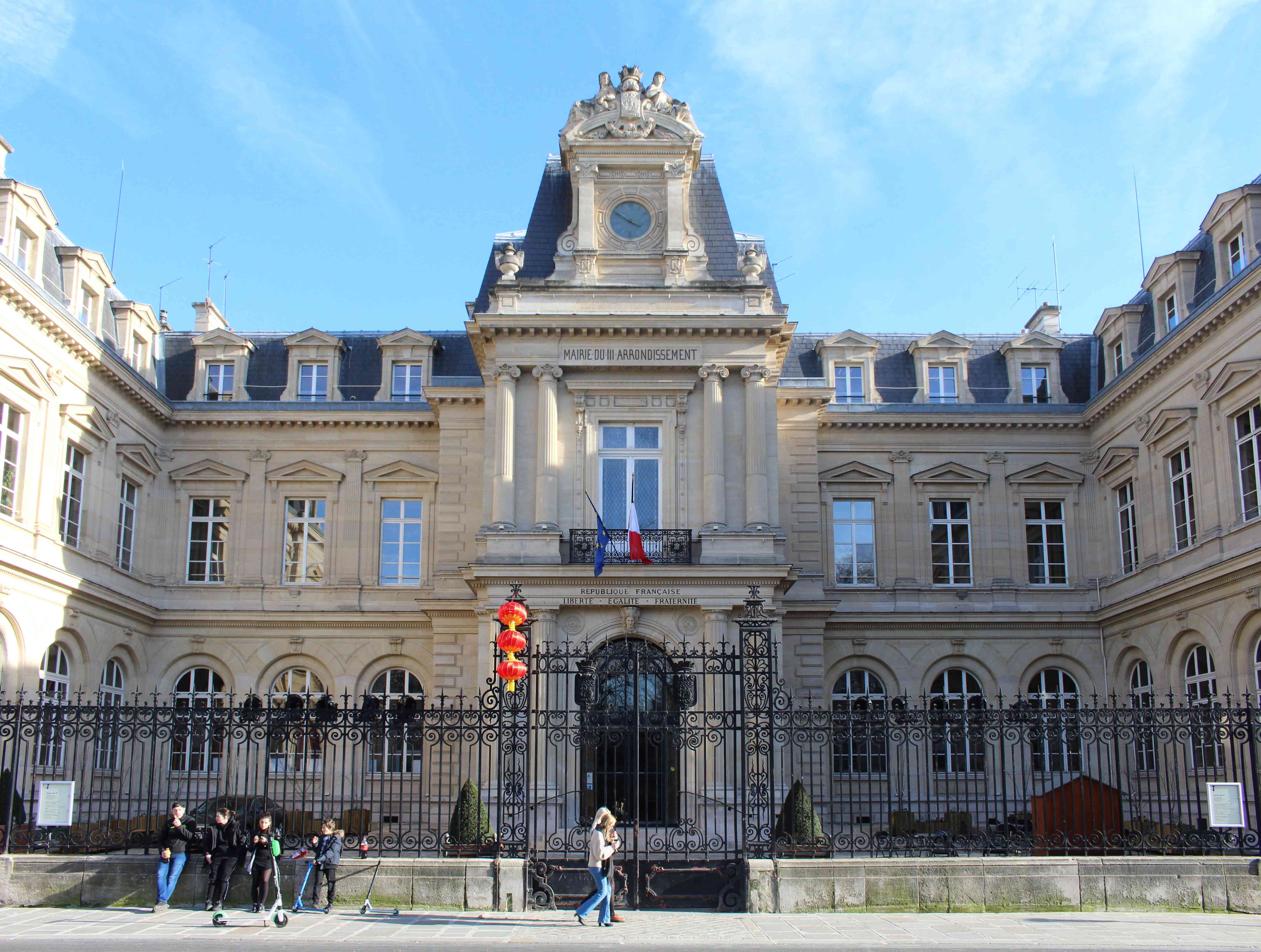 The grand historic facade of the 3rd Arrondissement Town Hall in Paris.
